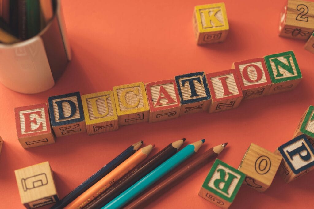 The image shows the role of education in social and economic development.