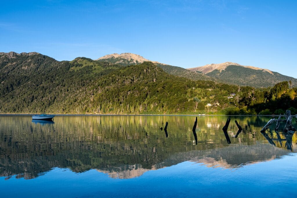 Peaceful lake landscape with mountains reflecting  makes pristine natural landscapes so restorative.