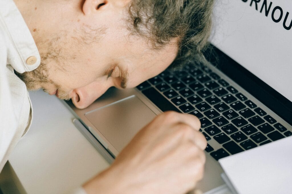 The man's image shows the hidden digital burnout signs that you should never ignore.