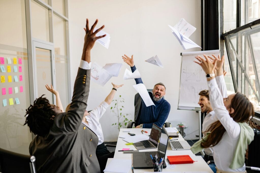 The image is representing to how extroverted leaders inspire team collaboration.