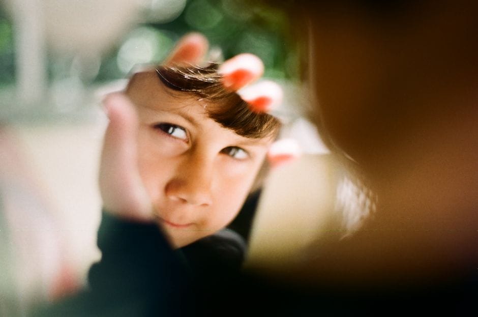 Person journaling to explore your inner child and heal childhood emotional wounds.