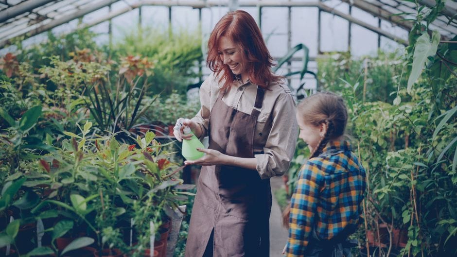 A family reviewing their budget to find affordable ways to live more sustainably at home.