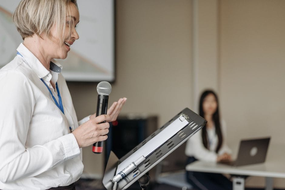 The image shows the how to overcome public speaking anxiety.